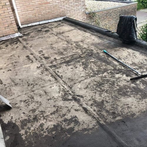 Onderhoud aan een plat dak Onderhoud aan een plat dak